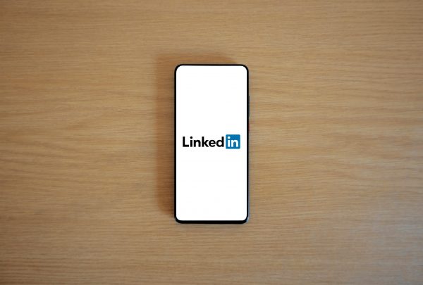 LinkedIn logo displayed on mobile phone